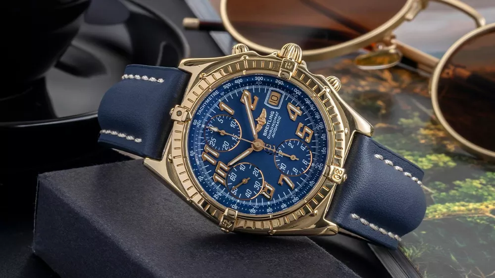 ساعت طلایی مردانه جذاب Breitling با صفحه آبی و بند چرمی آبی