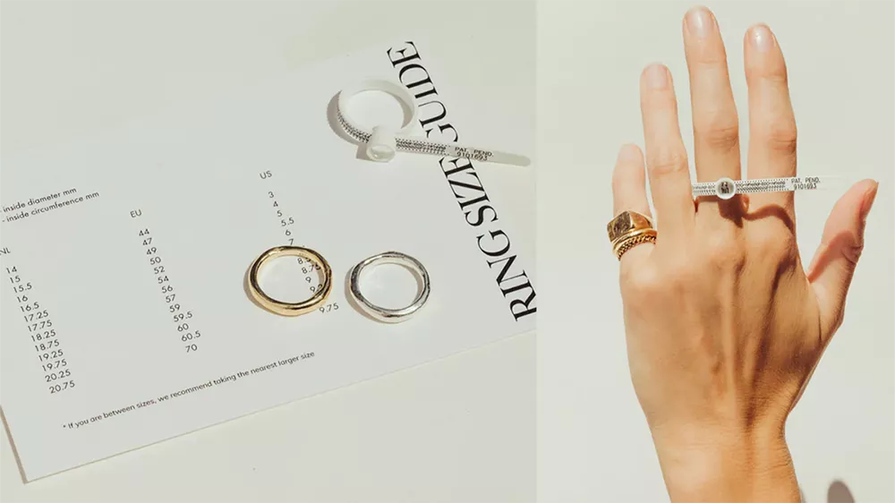 ۴ حلقه‌ی طلا، یک دست و خط کشی برای اندازه‌گیری سایز انگشتر