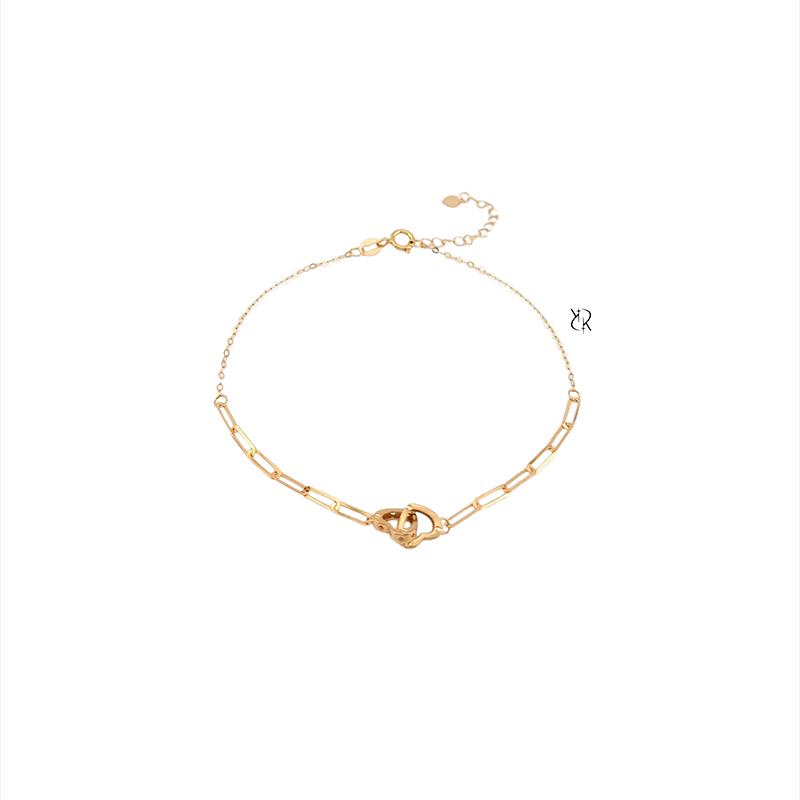 دستبند زنانه طلا ۱۸ عیار دستبند طلا طرح هرمس و دوقلب درهم