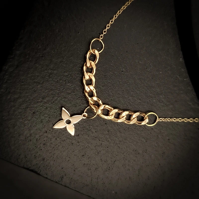 دستبند زنجیری طلا 18 عیار زنانه ناریا مدل چهارپر