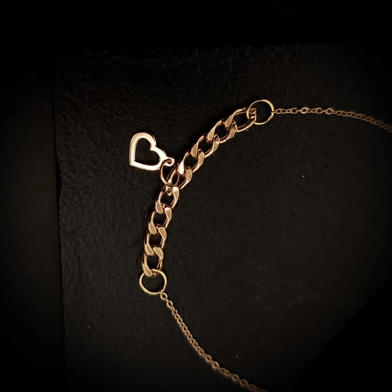 دستبند زنجیری طلا 18 عیار زنانه ناریا مدل کارتیر قلب